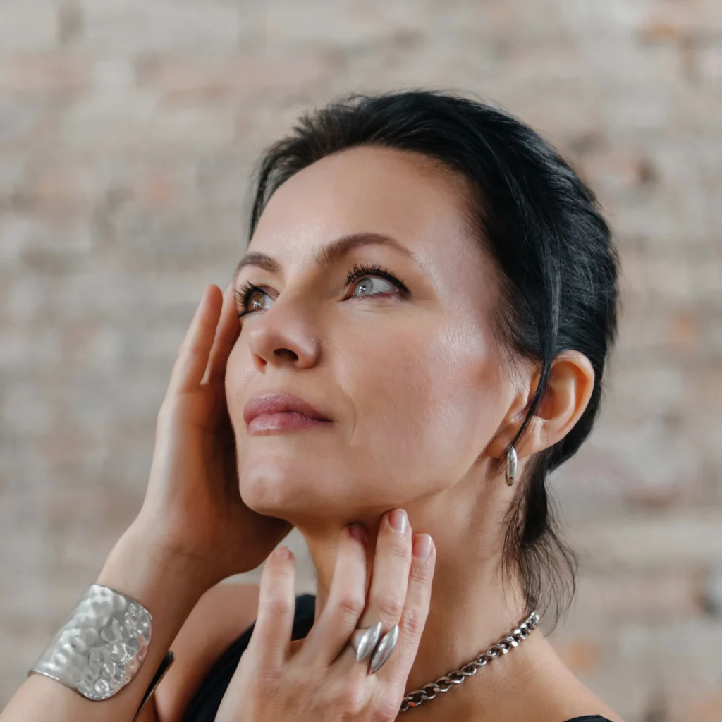 Beautiful middle aged women in black classic outfit